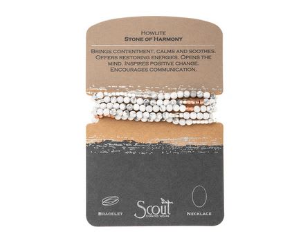 Beaded bracelet on a display card with text