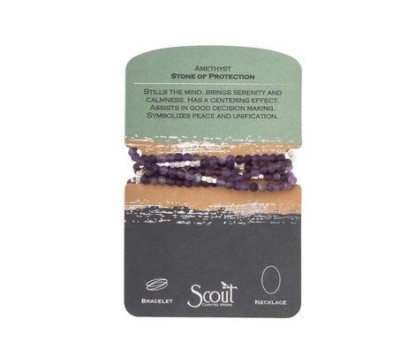 Purple beaded bracelet on a retail card labeled amethyst
