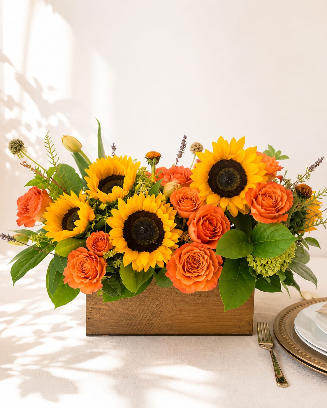 Sunshine - Lovely mix of sunflowers and seasonal orange blooms. Wood box length 12” approx.  