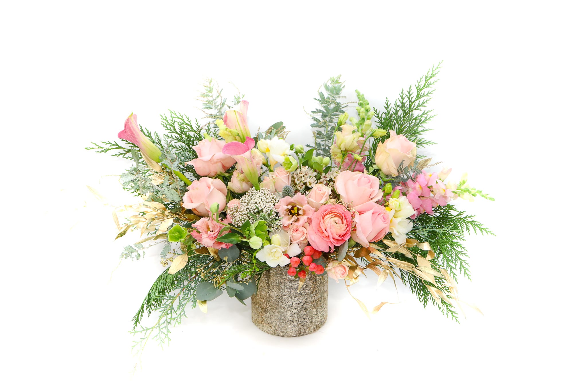 Pink and white floral arrangement in a textured vase