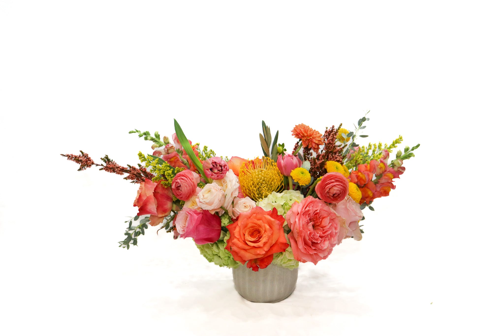 Colorful mixed bouquet in a gray vase