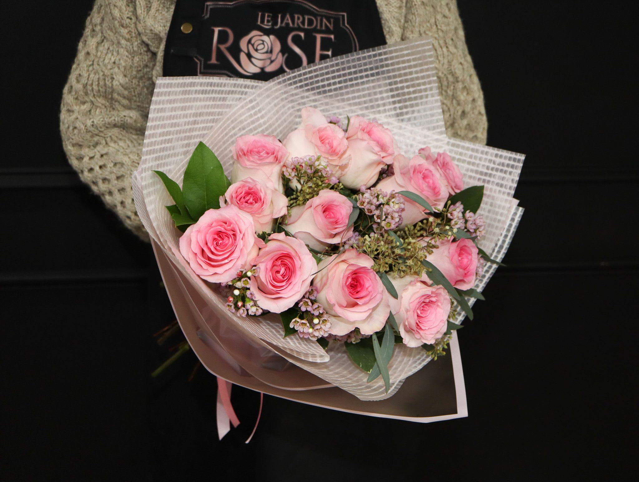 Classic Pink  - A classic one dozen pink roses with pink/white wax flowers.