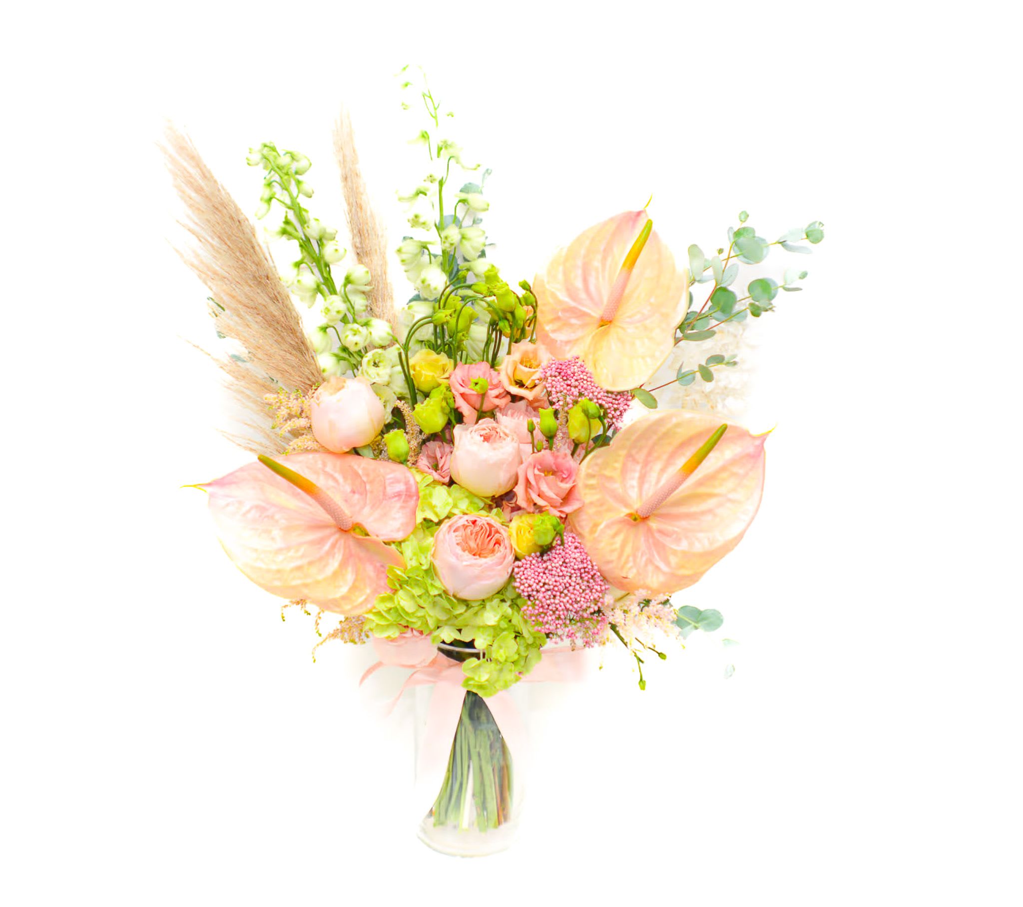Anette - Front side bouquet! Whimsical and elegant, Anette arrangement features a lovely mix of white, green and pink-peach flowers. With delicate blush anthurium, peach garden roses, soft white delphinium, green hydrangea and pampas grass. This lush bouquet manages to find a happy balance between understand and dramatic. Anthuriums Symbolize Hospitality Due to their open, heart-shape and long-lasting characteristics they are popular as hostess or hospitality gifts.