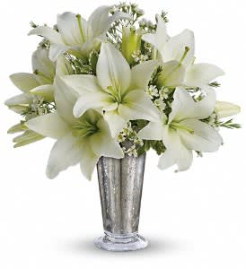 Written in the Stars  [TT7-1A] - Elegant white lilies and pretty white waxflower stems are exquisitely arranged in a silver Mercury Glass Antique vase that's reminiscent of a star-filled sky. It really is a wish come true. Approximately 12 1/2" W x 14" H