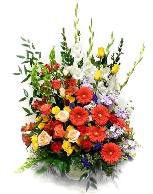 Tall mixed bouquet with red gerberas, roses, and white lilies