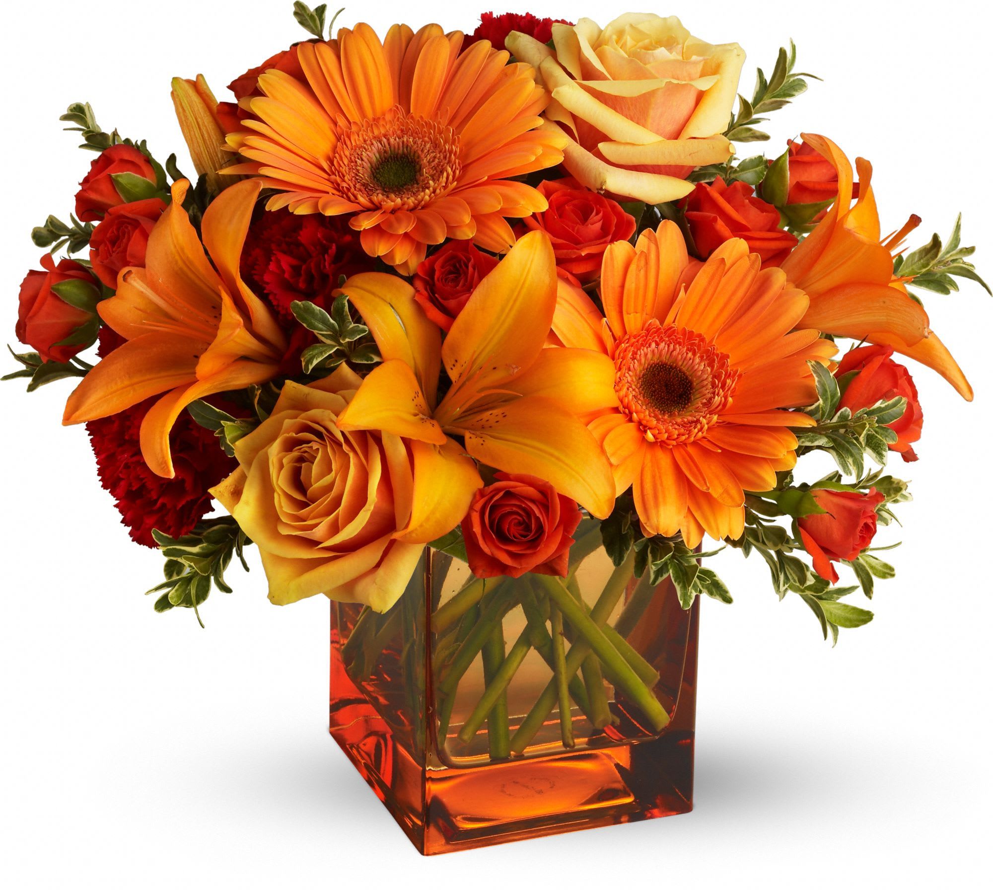 Orange and red mixed bouquet in a square glass vase