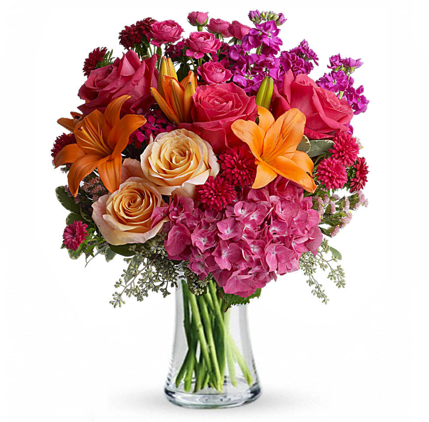 [TT-WEB643]: Joy Forever  - Wow! That's what they'll say when this explosion of color arrives at the front door. They'll love the flowers, the clear glass vase - and you for having such exciting taste. A win-win for everybody!  The vibrant bouquet includes pink hydrangea, peach and hot pink roses, orange Asiatic lilies, purple stock, hot pink Matsumoto asters, peach statice, magenta Sweet William and hot pink spray roses accented with fresh greenery.   Bouquet is approximately 15 1/2” W x 21” H   