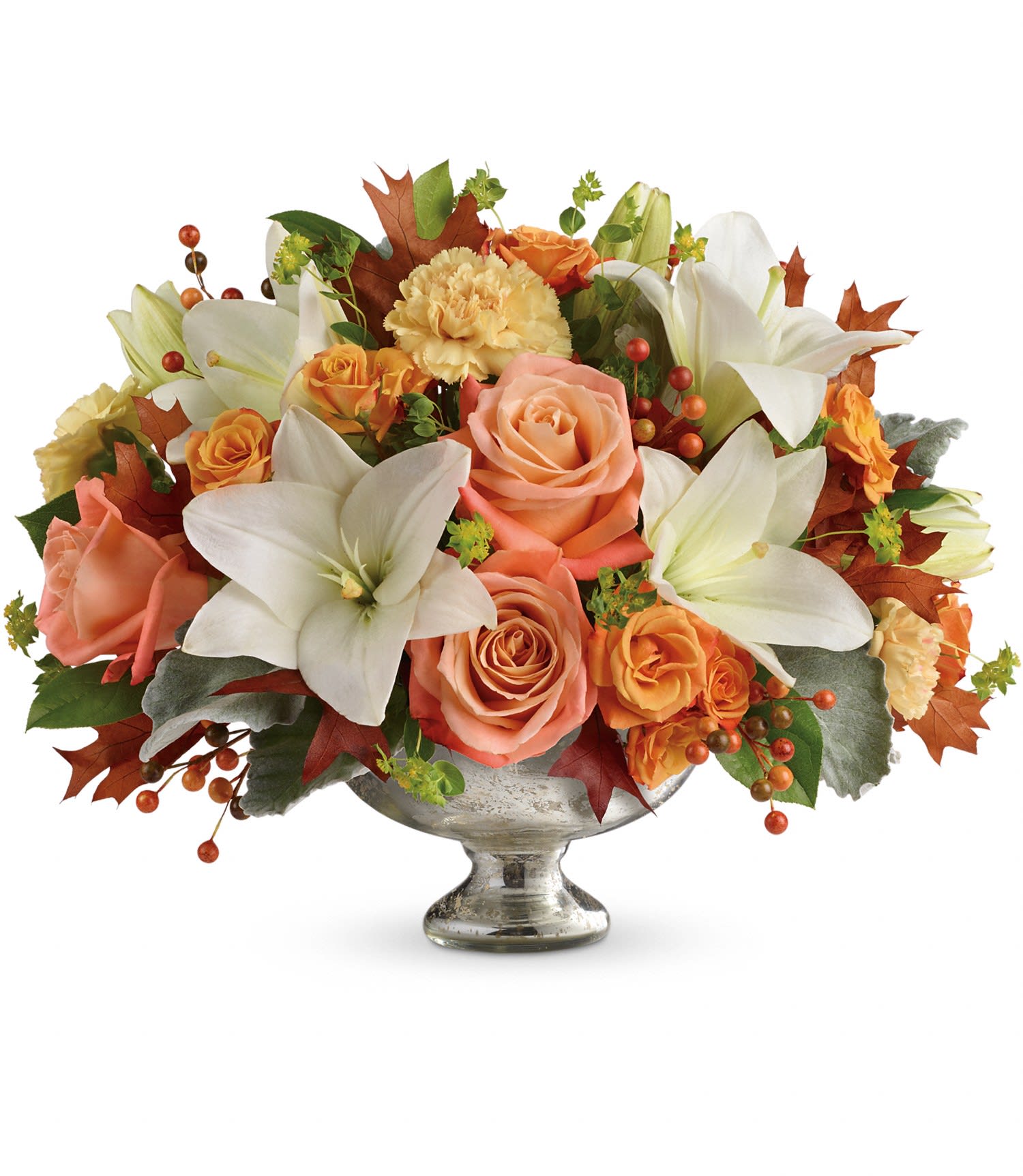 Harvest Shimmer Centerpiece - This stunning centerpiece arrangement features peach and light orange roses, white asiatic lilies, peach carnations and orange berries and is finished with dusty miller, bupleurum and lemon leaf. Delivered in a Mercury Glass bowl. Approximately 18 1/2" W x 14" H