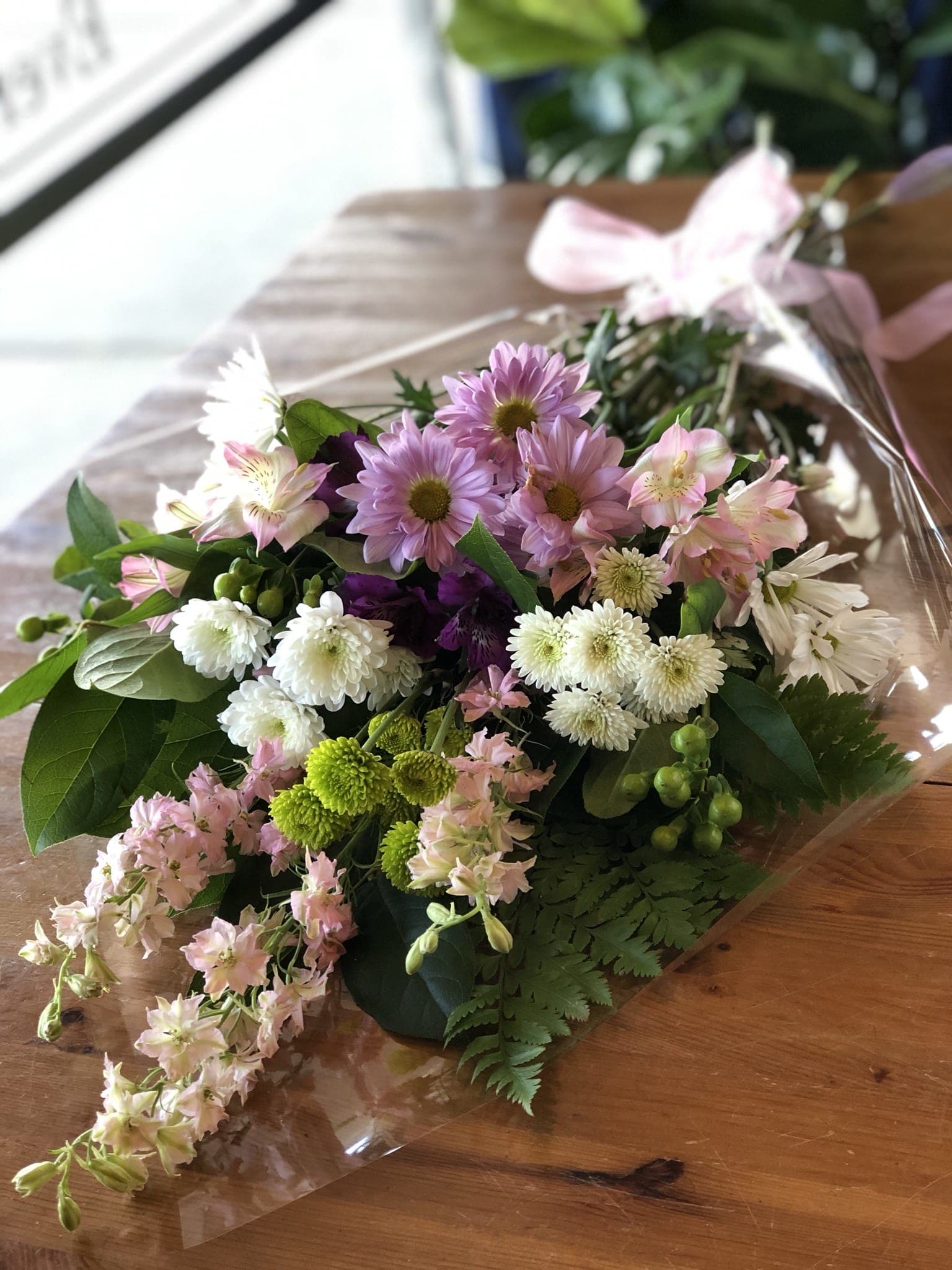 Let's go to Prom!  - A beautiful mixed medley of cheerful flowers in a cut bouquet to ask your date out for prom.  