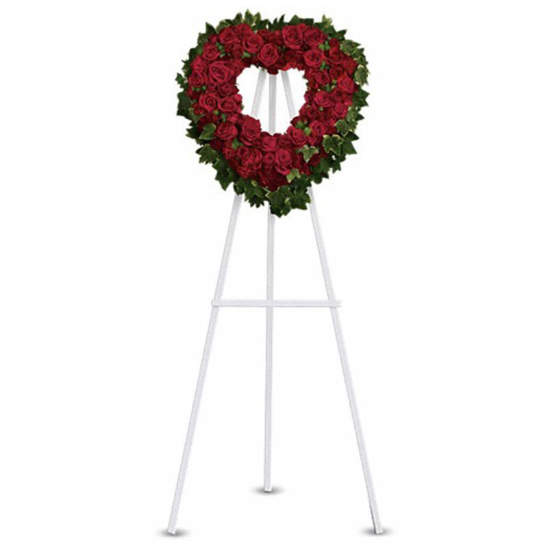 Blessed Heart [T225-2A] - A beautiful heart is a wonderful way to share your thoughts of love.  Red roses, spray roses, carnations and miniature carnations are arranged with fern and ivy in the shape of a heart.  Approximately 23" W x 24" H  Orientation: One-Sided  As Shown : T225-2A