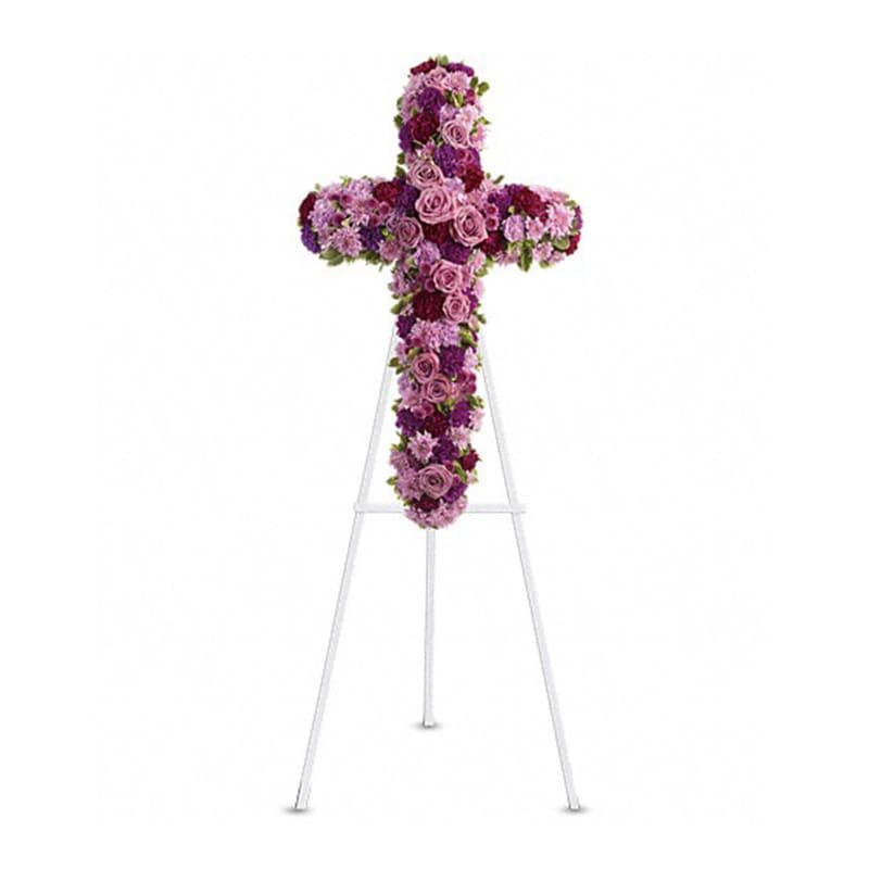 Deepest Faith [T238-1A] - Pride, dignity, admiration and faith are on beautiful display in this moving sympathy arrangement. It's a meaningful way to deliver your heartfelt message.  Beautiful flowers such as lavender roses, carnations and cushion spray chrysanthemums along with fuchsia and purple carnations and button spray chrysanthemums create a dazzling cross that is full of hope and devotion.  Approximately 23" W x 38" H  Orientation: One-Sided  As Shown : T238-1A