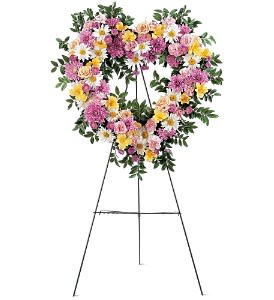  Loving Heart Tribute [TF199-4] - This lovely heart-shaped design will leave no doubt just how much love you want to show family and loved ones.  Each spray is created with lavender chrysanthemums, white daisies, yellow alstroemeria, pink asters and spray roses, delivered on an easel.  Approximately 22" W x 22" H  Orientation: One-Sided      As Shown : TF199-4  