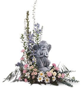  Pastel Dreams with Angel [TF220-1] - What could be more comforting than a lovely angel watching over a glorious arrangement of pastel flowers?  One arrangement arrives decorated with white daisies, pink carnations and roses, and baby blue delphinium surrounding an angel statue.  Approximately 22" W x 33" H  Orientation: One-Sided      As Shown : TF220-1  