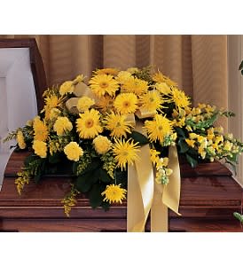  Brighter Blessings Casket Spray [TF211-1] - This traditional yellow casket spray reminds family and friends of all the bright and joyful memories.  One half-couch casket spray arrives with yellow carnations, chrysanthemums, gerberas and snapdragons accented with cascading yellow ribbon.  Approximately 41" W x 28" H  Orientation: All-Around      As Shown : TF211-1  