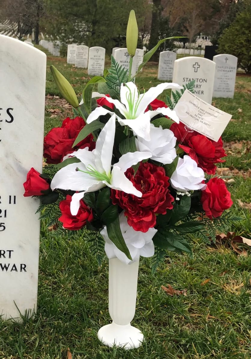 [TT-ANCSILKRW]:  SILK ROSE AND LILY TRIBUTE  (ARTIFICIAL FLOWERS) - ROSE AND LILY TRIBUTE ARRANGEMENT BY TWIN TOWERS FLORIST IN ARLINGTON, VA. (ARTIFICIAL FLOWERS)  RED AND WHITE PREMIUM QUALITY SILK (ARTIFICIAL) ROSES AND LILIES ARRANGED IN OUR CEMETERY APPROVED POLYMER CONE CONTAINER WITH SPIKED BASE.  SILK FLOWERS ARE PERMITTED AT ARLINGTON NATIONAL CEMETERY AFTER OCTOBER 15 UNTIL APRIL 15.  CLICK THE LINK FOR ARLINGTON CEMETERY FLOWERS IN THE NAVIGATION BAR AT THE TOP OF OUR HOMEPAGE TO VIEW OUR EXCLUSIVE CEMETERY SELECTIONS WITH A CUSTOM CHECKOUT DESIGNED SPECIFICALLY FOR ANC DELIVERIES.  As Shown : TT-ANCSILKRW