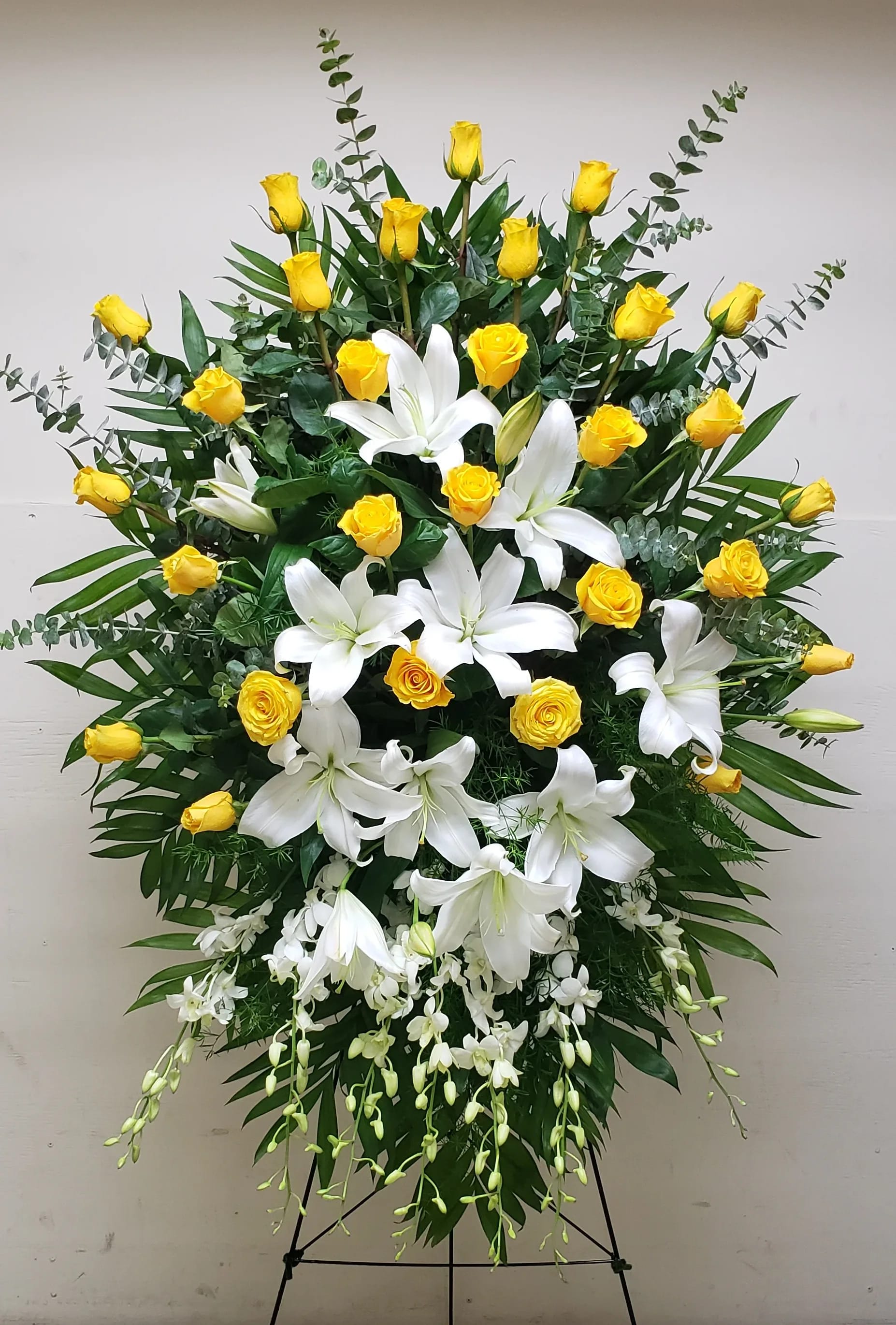 [TT-ANC121]:   GLORY AND HONOR SPRAY - GLORY AND HONOR STANDING SPRAY ON EASEL BY TWIN TOWERS FLORIST IN ARLINGTON, VA