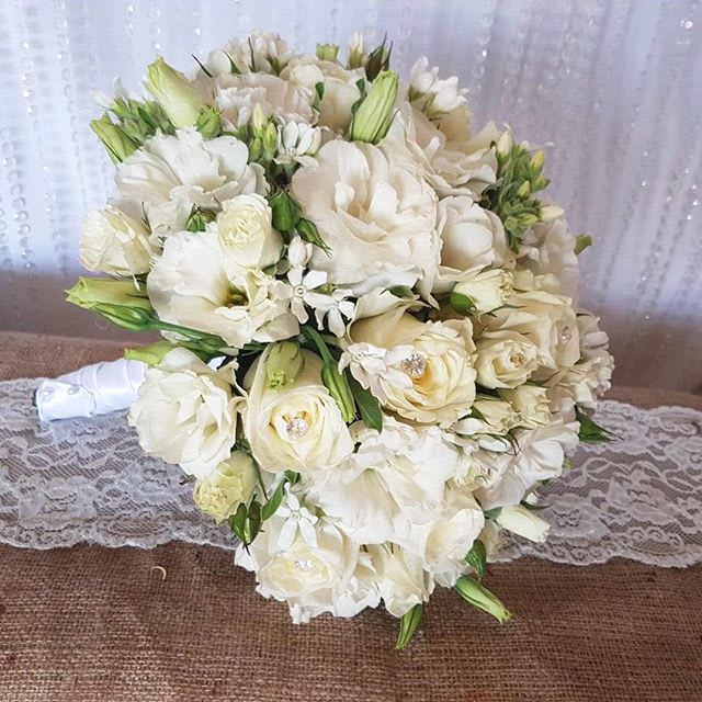 White Day - Modern classy white flower bouquet for your special day.
