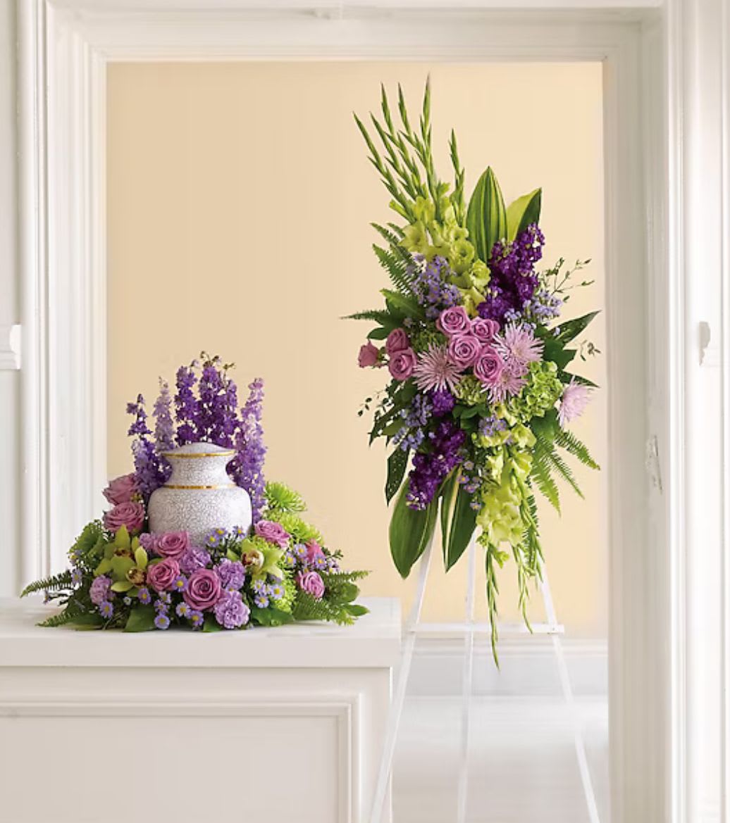 Lavender Grace Set - This urn and spray set features a graceful blend of purple ,greens and lavender blooms, offering a serene and heartfelt tribute