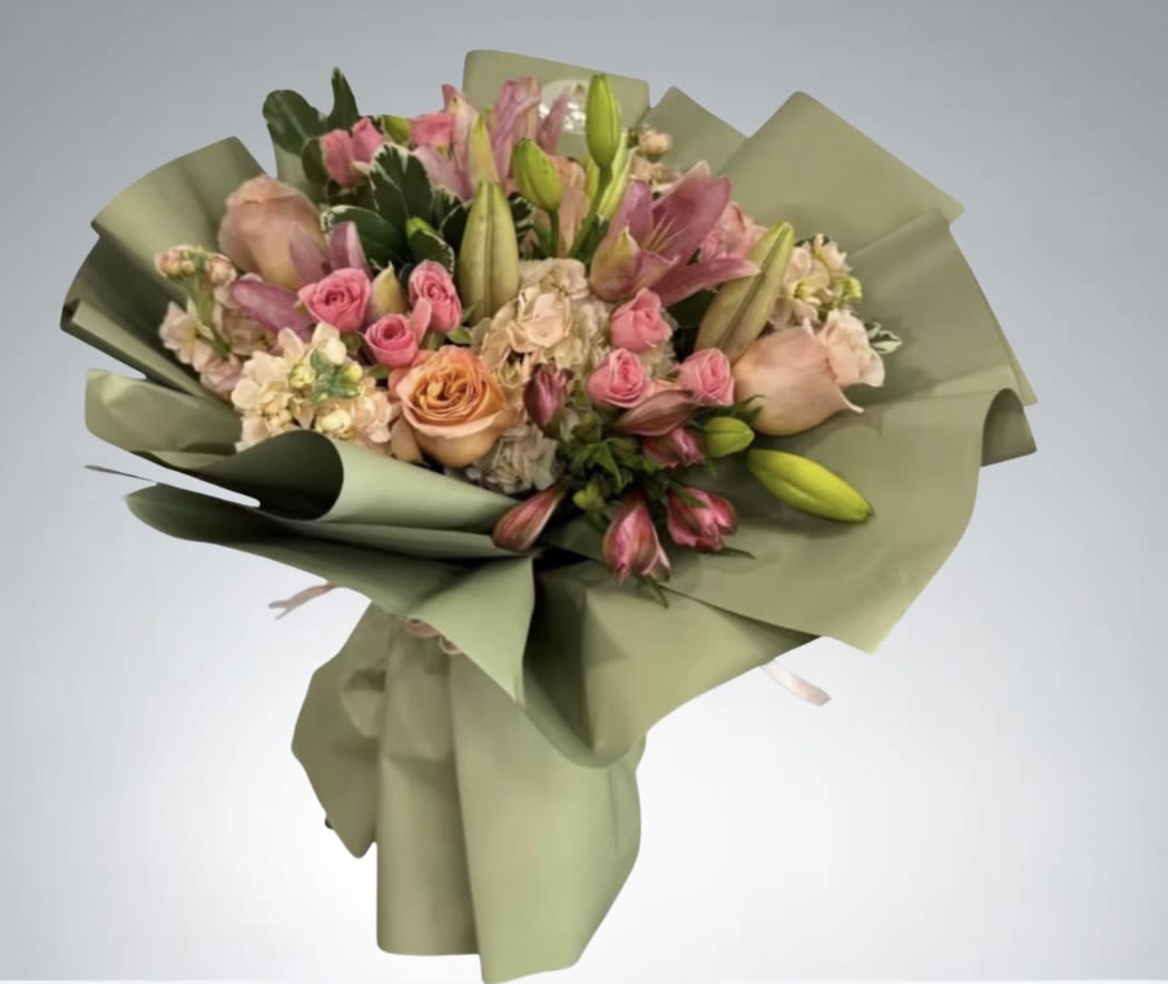Floral Fantasy bouquet  by D'Lily's Flowers  - A beautiful mix of beautiful blooming flowers, garden floral fantasy!  Put together with lilys, roses, hydrangeas, spray rose and many more !  Disclaimer: No Vase Included. 