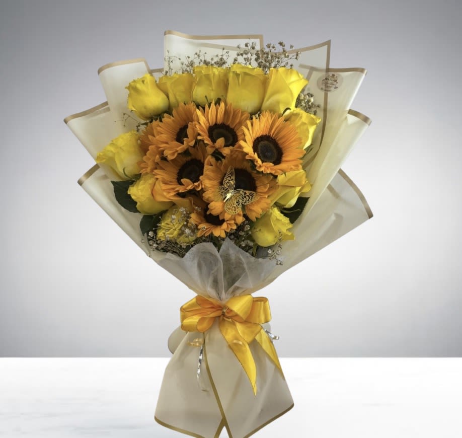 Sunflower Rose Delight Bouquet  - A radiant bouquet of sunflowers and yellow roses that brings warmth, joy, and sunshine to every moment.  Disclaimer: This is a wrapped bouquet. No Vase Included. 