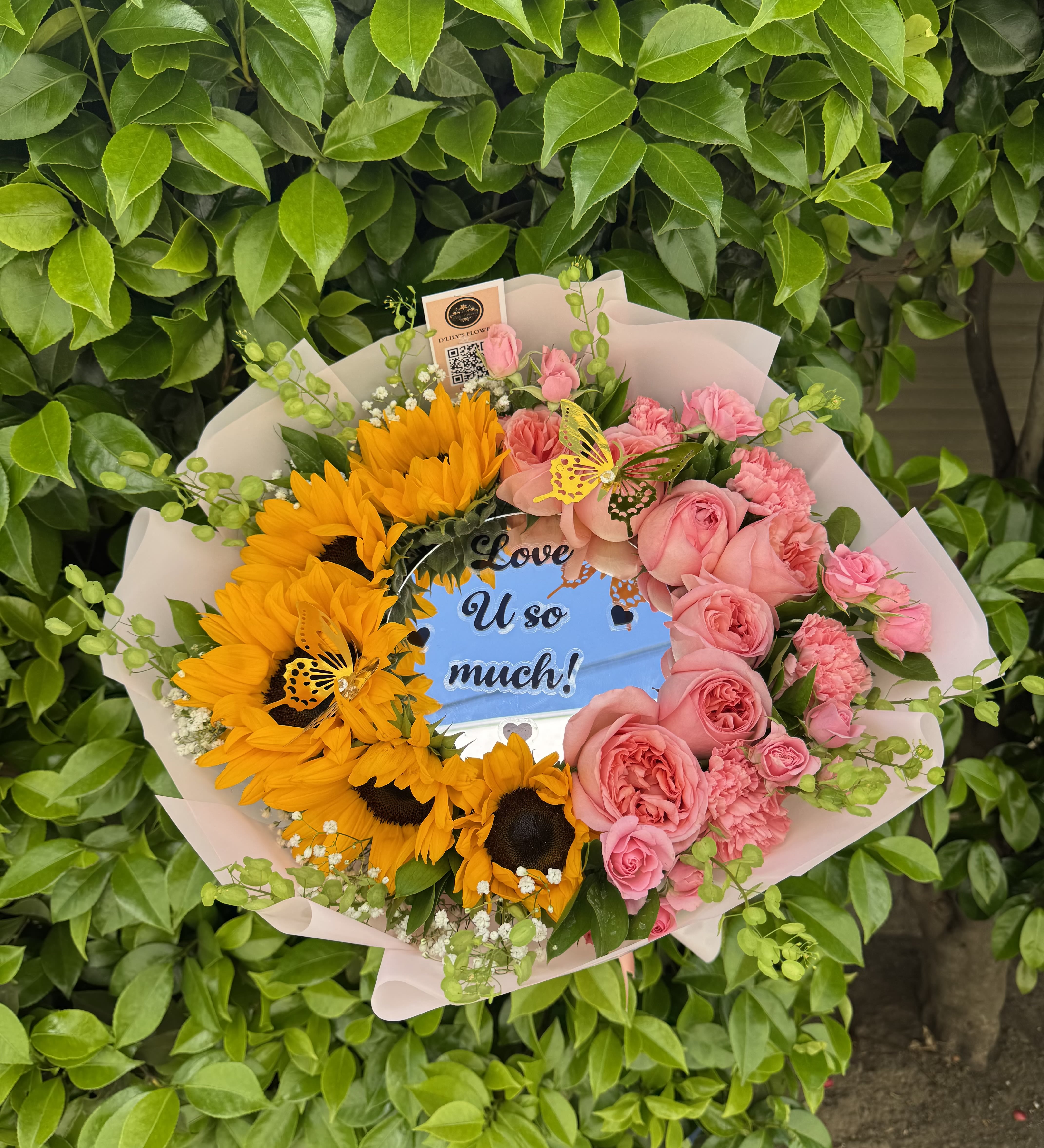 Mirror Bouquet - A sweet mix of sunny blooms and soft pink petals, made to brighten hearts. Disclaimer: No Vase Included. 