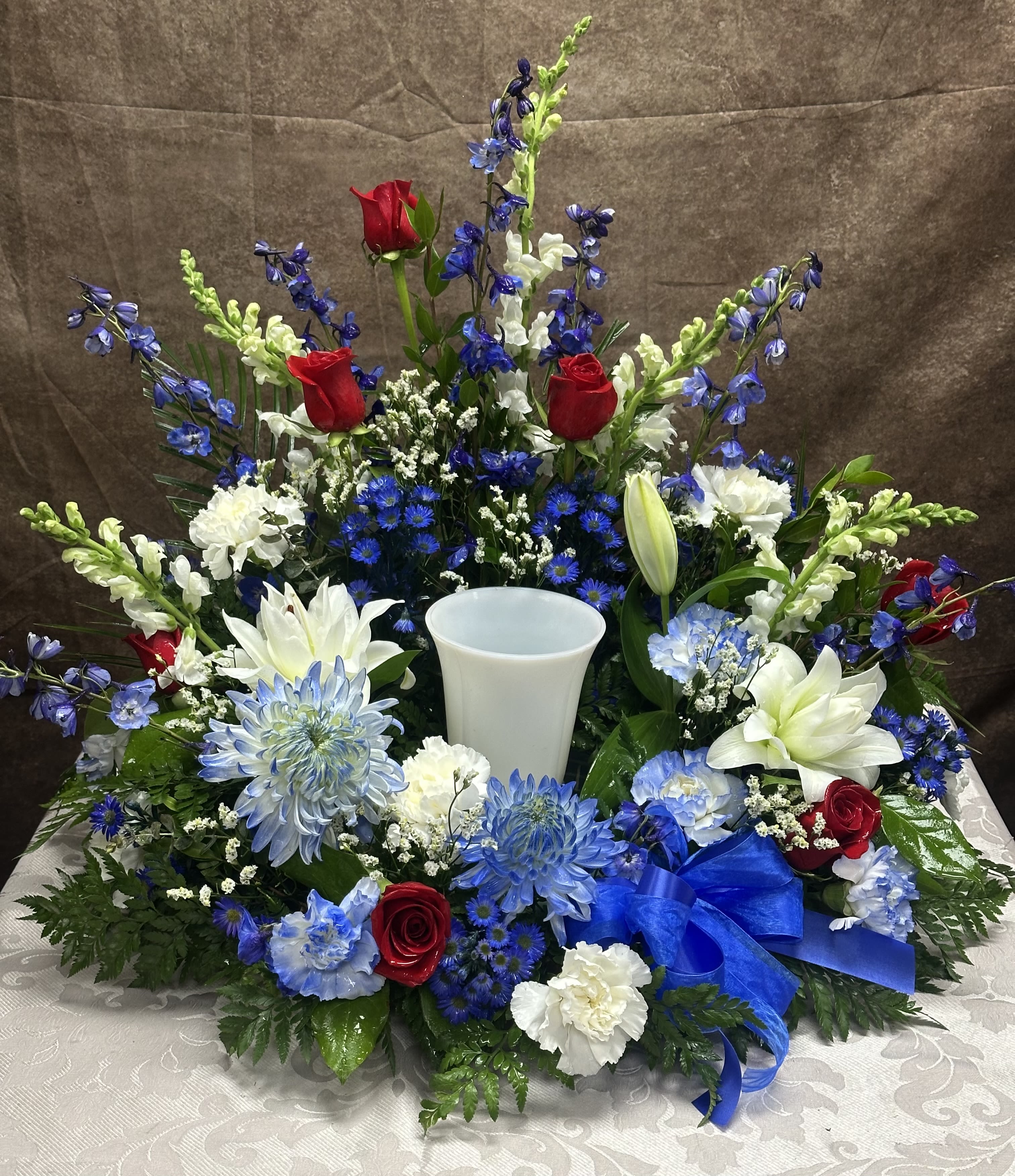 Patriotic Urn Wreath - A mix of red, white and blue for military honor.
