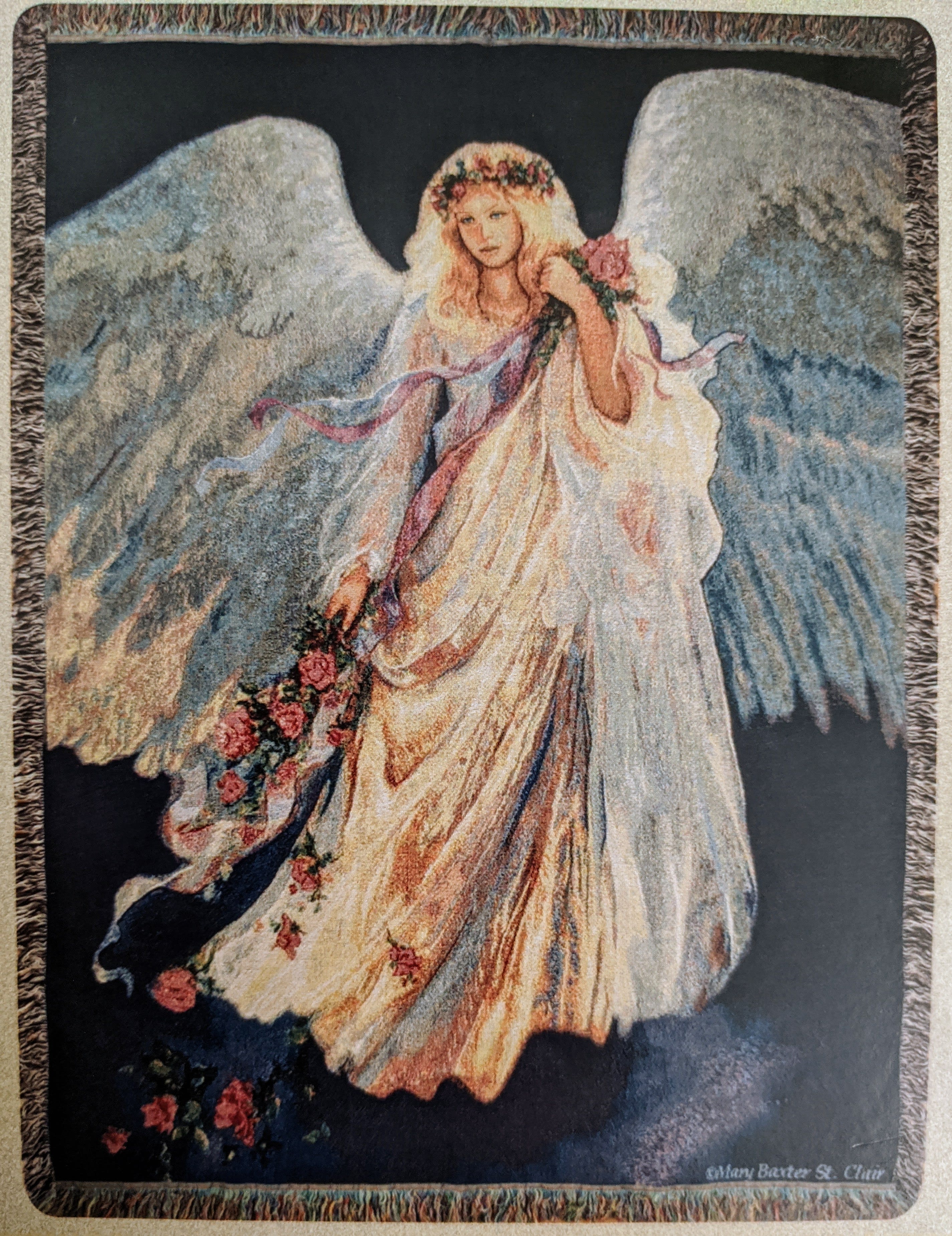 Tapestry of an angel in a flowing dress holding flowers