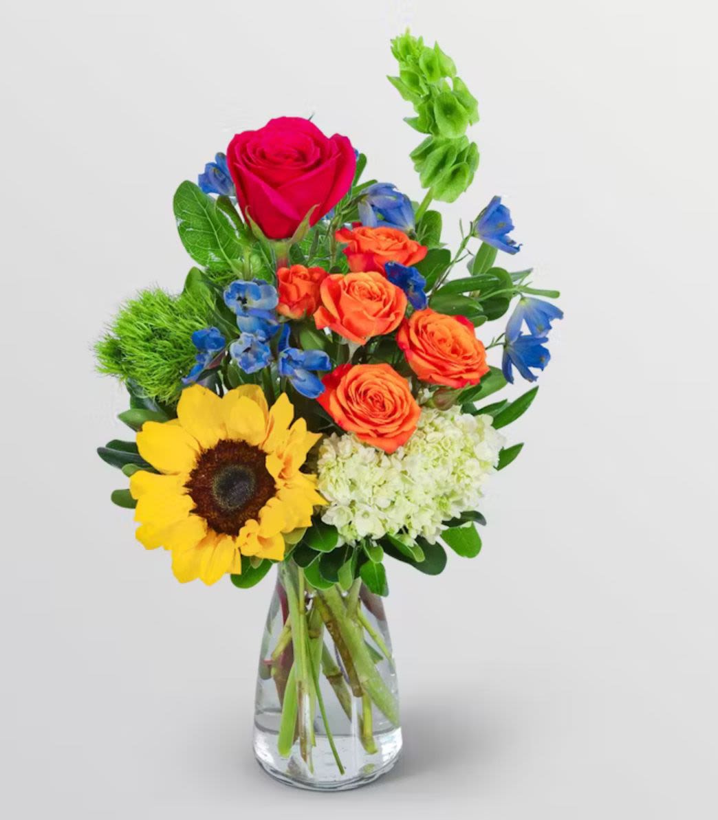 Dance of love - multicolor mix flowers arrangement in a clear vase 