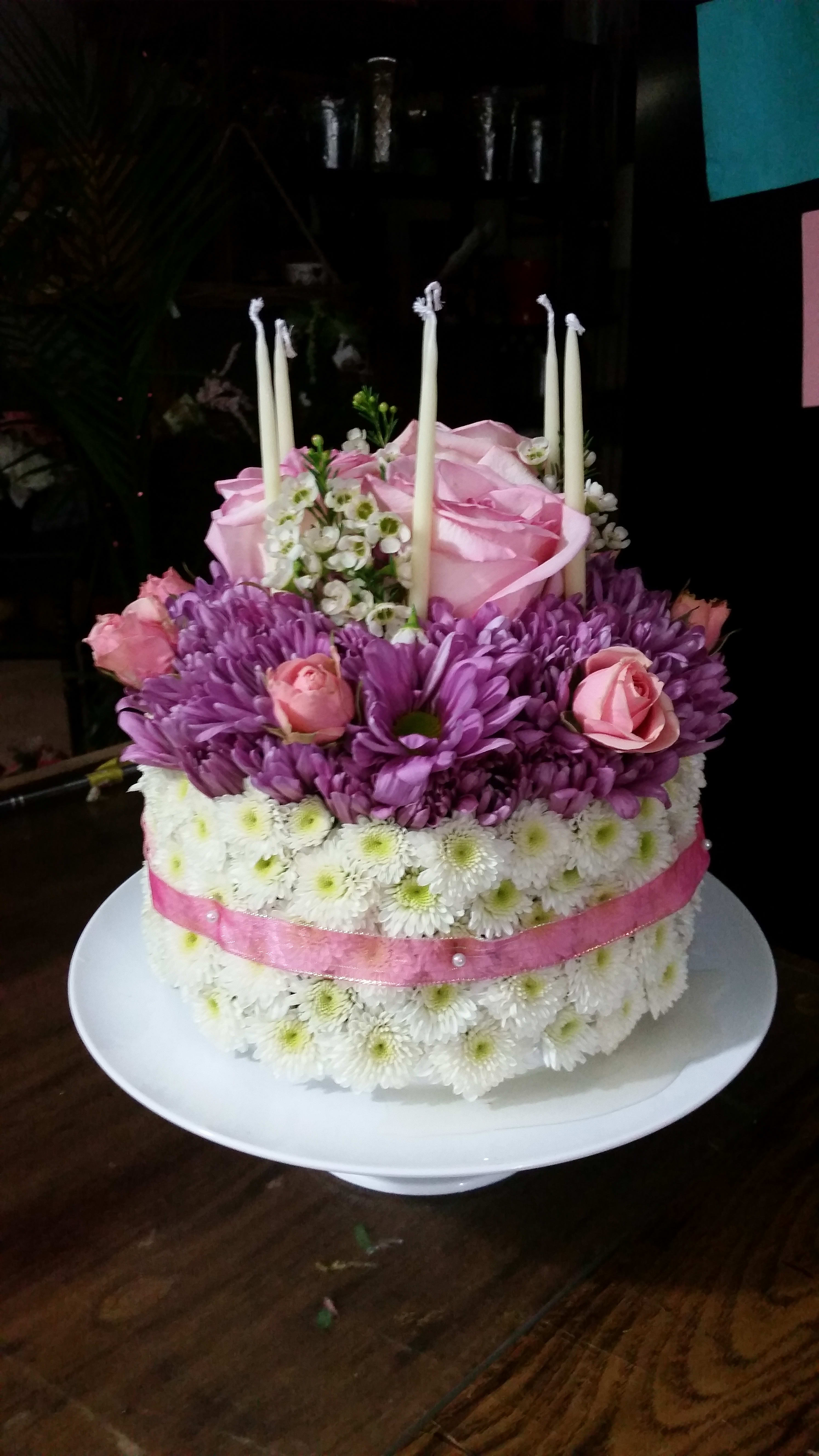 Blooming Birthday Cake - They'll never forget this incredible birthday surprise! Spray roses, pompons and mums create a fun-filled, fat-free birthday greeting.