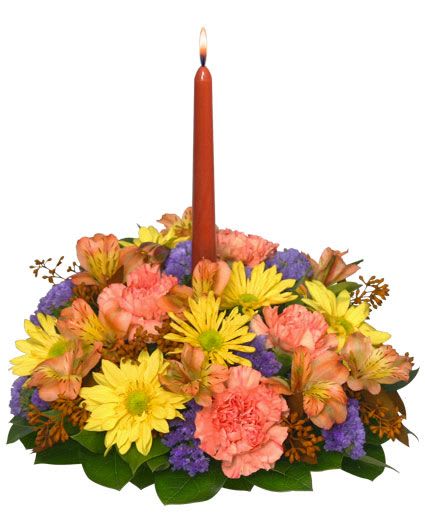 GRATEFUL EXPRESSIONS Centerpiece - Utility Container With, Taper Candle, Foliage: Salal Tips, Green Pittosporum, Brown Seeded Eucalyptus, Orange Carnations, Yellow Daisy Mums, Peach Alstroemeria, Purple Statice. 