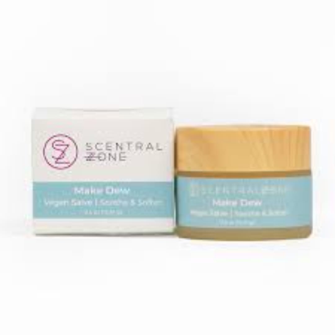 Two scented candle products in boxes on a white background