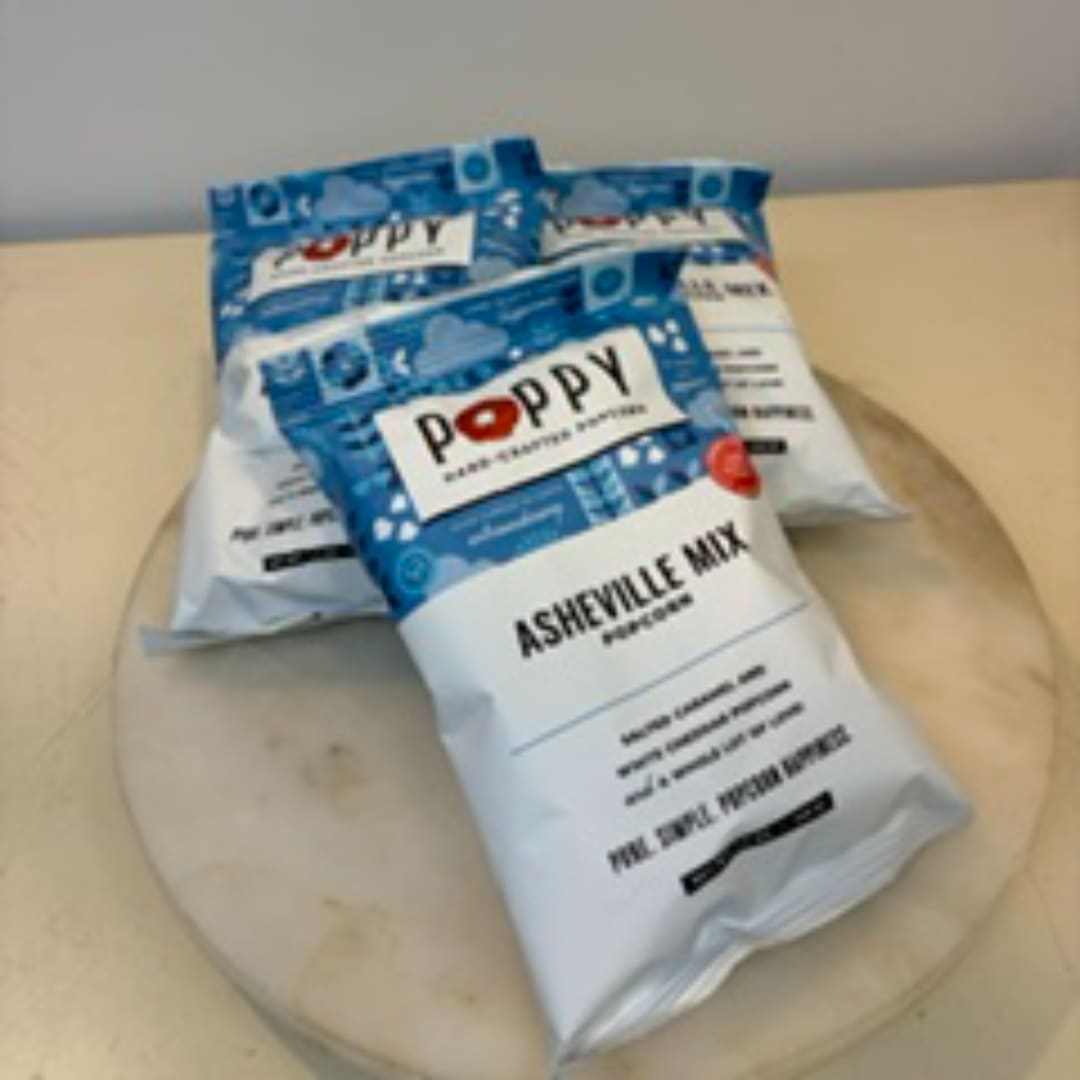 Three bags of Poppy ashville mix on a round board