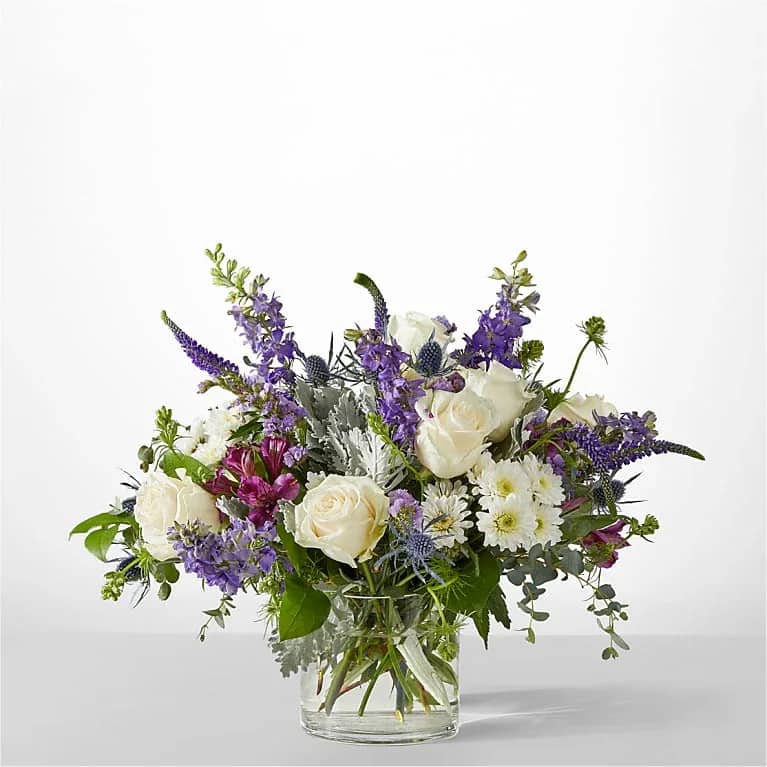 Shooting Star Bouquet - A bouquet so gorgeous it feels like a once in a lifetime event. The Shooting Star Bouquet is bursting with dreamy ivory roses, striking veronica, and scented eucalyptus.