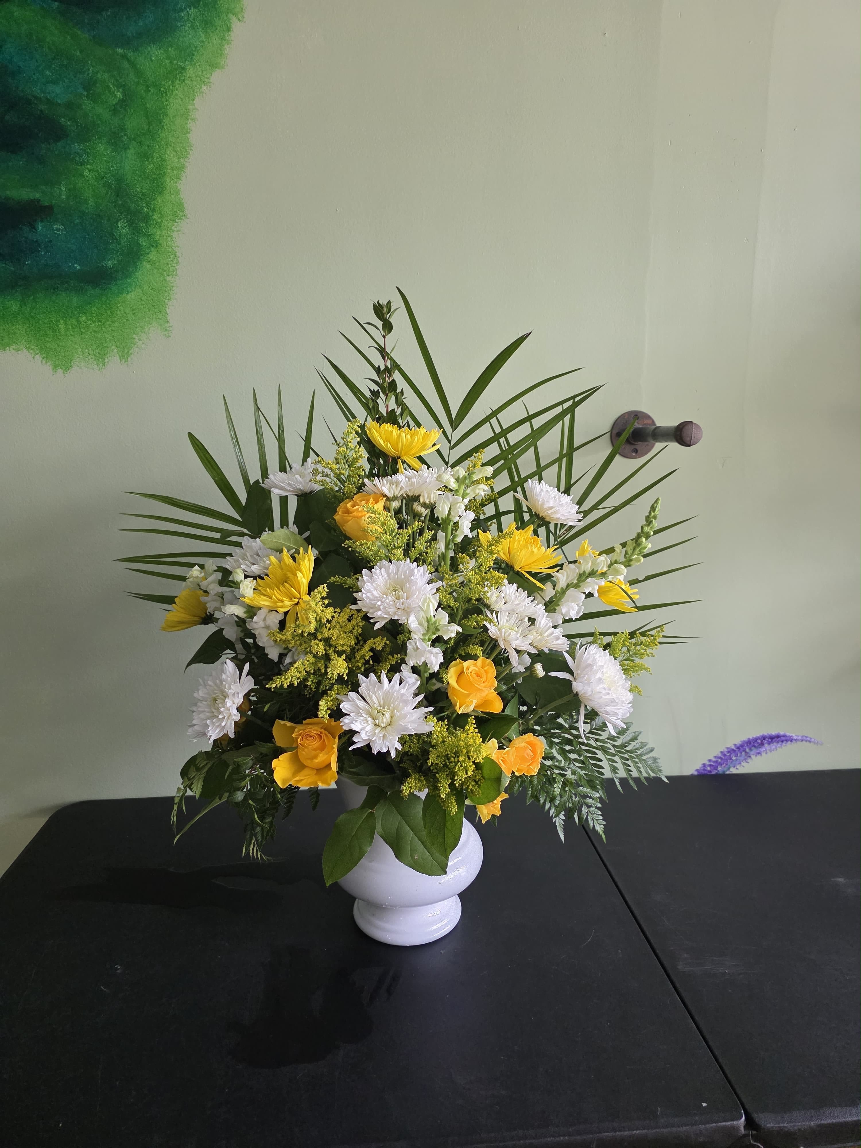 Sunny Memories Tribute - Bright yellow roses and crisp white chrysanthemums form the heart of this flower arrangement, a Sunny Memories tribute perfect for sympathy and remembrance or for celebrating a life with warmth. As a funeral spray alternative or a thoughtful remembrance arrangement, the cheerful yellow and serene white palette conveys comfort and hope-she'll feel remembered and gently honored when these blooms arrive.