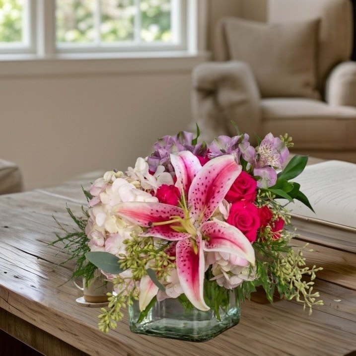 Always Bee You - Create a buzz. Always Bee You is a reminder that you are special and always present. Flowers like hydrangeas and a stargazer lily are uniquely arranged in this stunning cube.