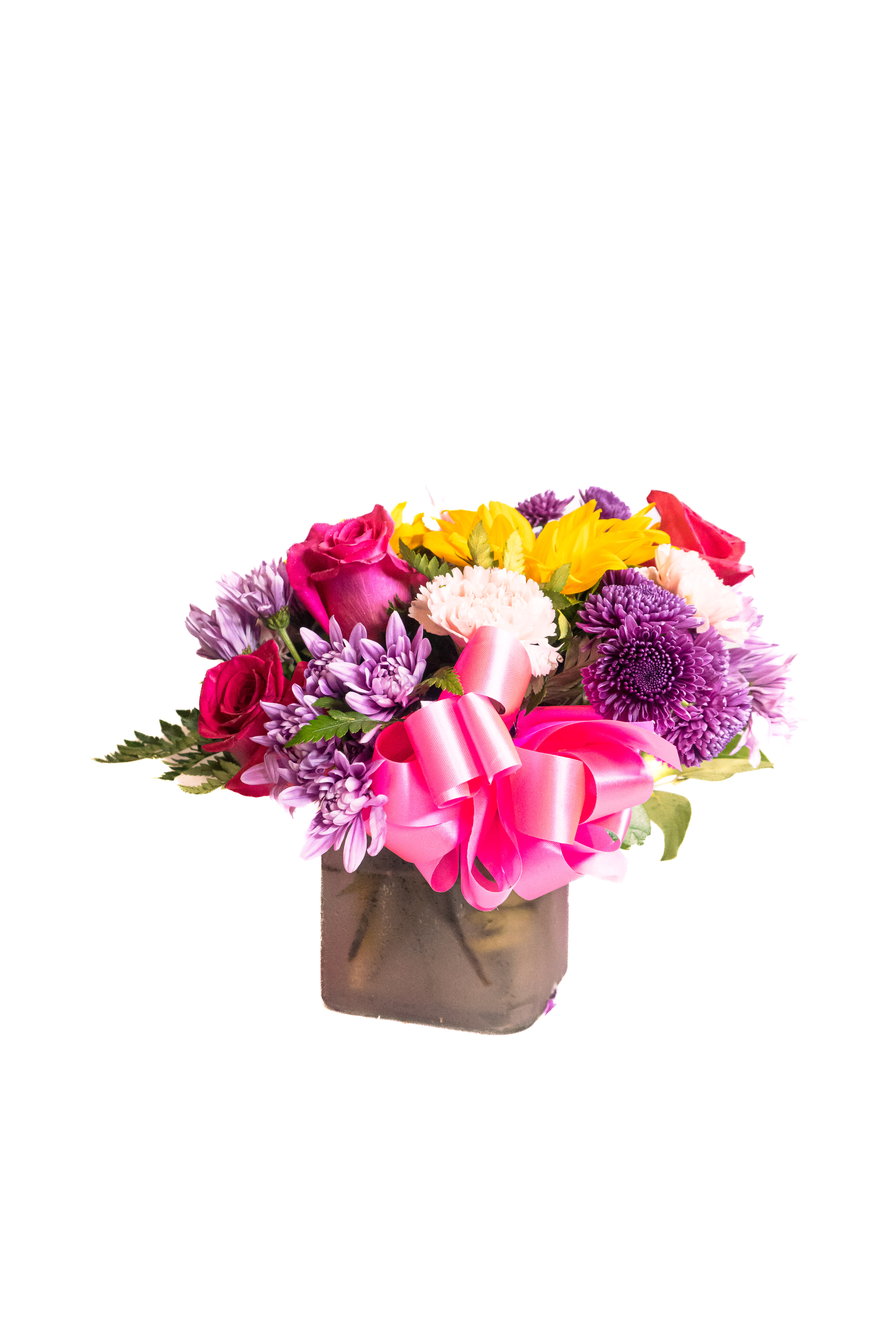 Little Lover by San Jose Flowers - big thing's come in small packages. Especially when you gift this arrangement full of love. perfect for a coffee table or office desk. just a little reminder that someone is loved. With shades of pink and purple blooms and just a splash of yellow too keep thing interesting.