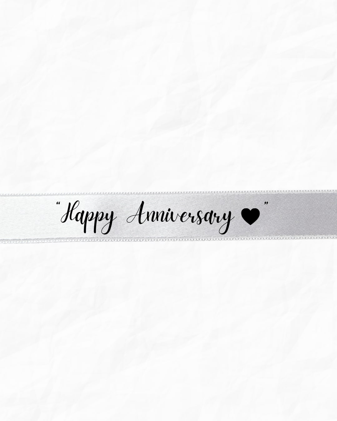 White ribbon with "Happy Anniversary" text and a heart