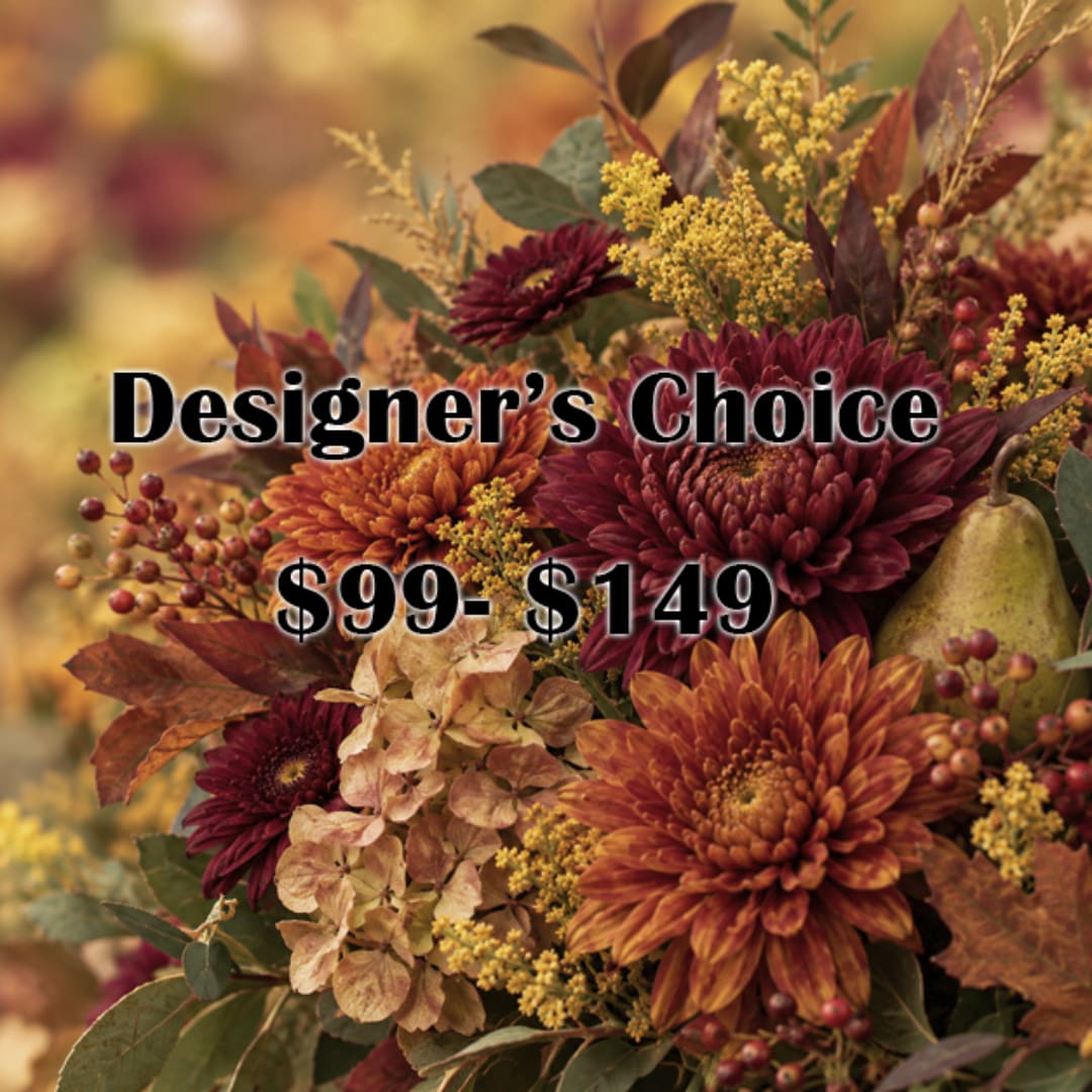 Autumn bouquet with burgundy and orange flowers and berries