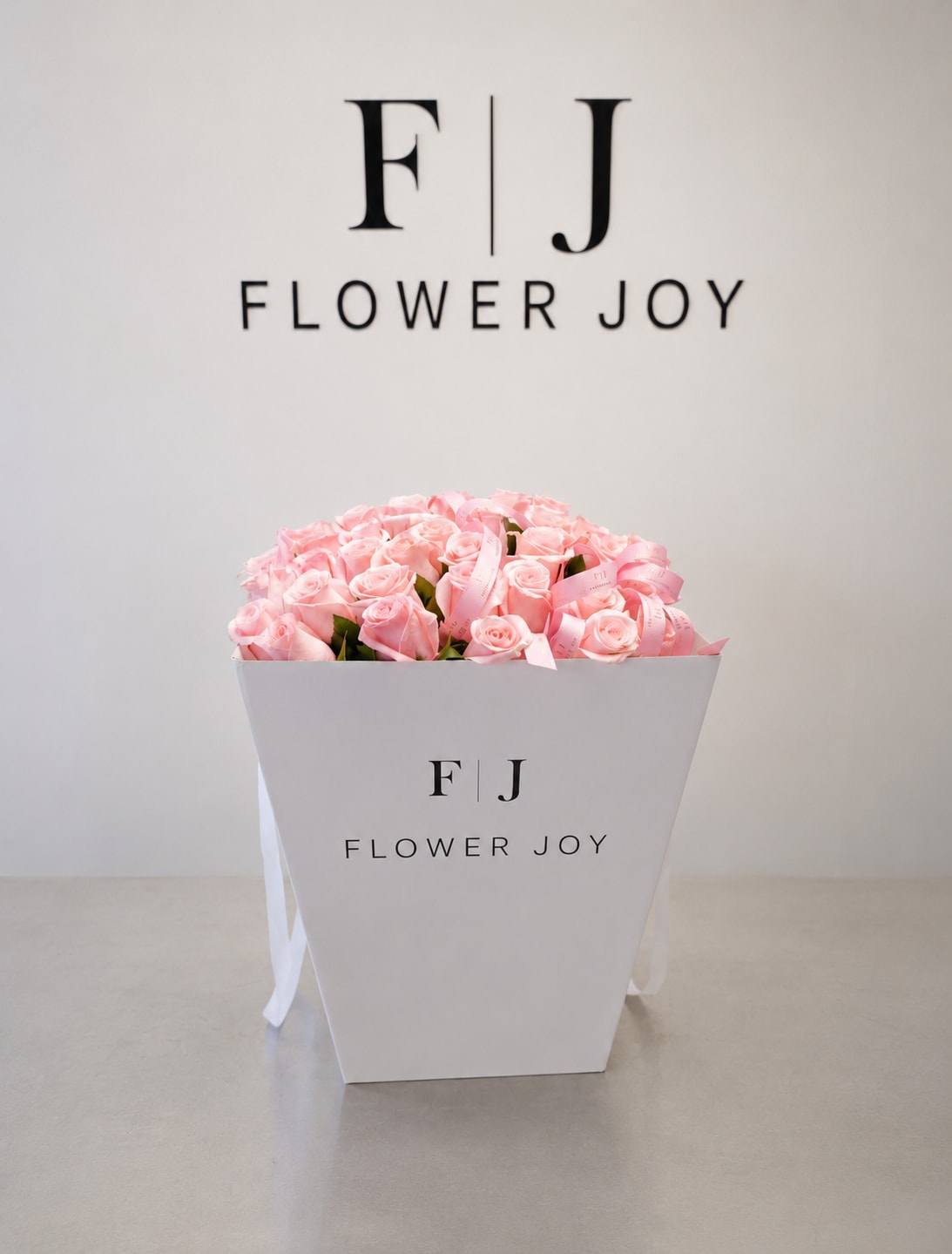 Blush Rose Gift Box - A charming arrangement of soft pink roses, beautifully presented in a signature Flower Joy box and finished with delicate ribbon details. Romantic, elegant, and timeless, perfect for birthdays, anniversaries, congratulations, or a thoughtful surprise.