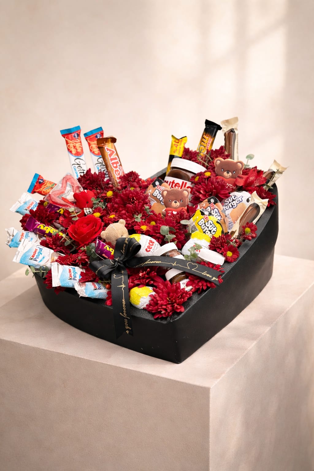 Chocolate gift box with red flowers and teddy bears