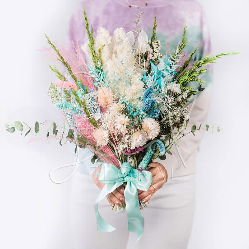 Large pastel bouquet with dried flowers and a satin ribbon