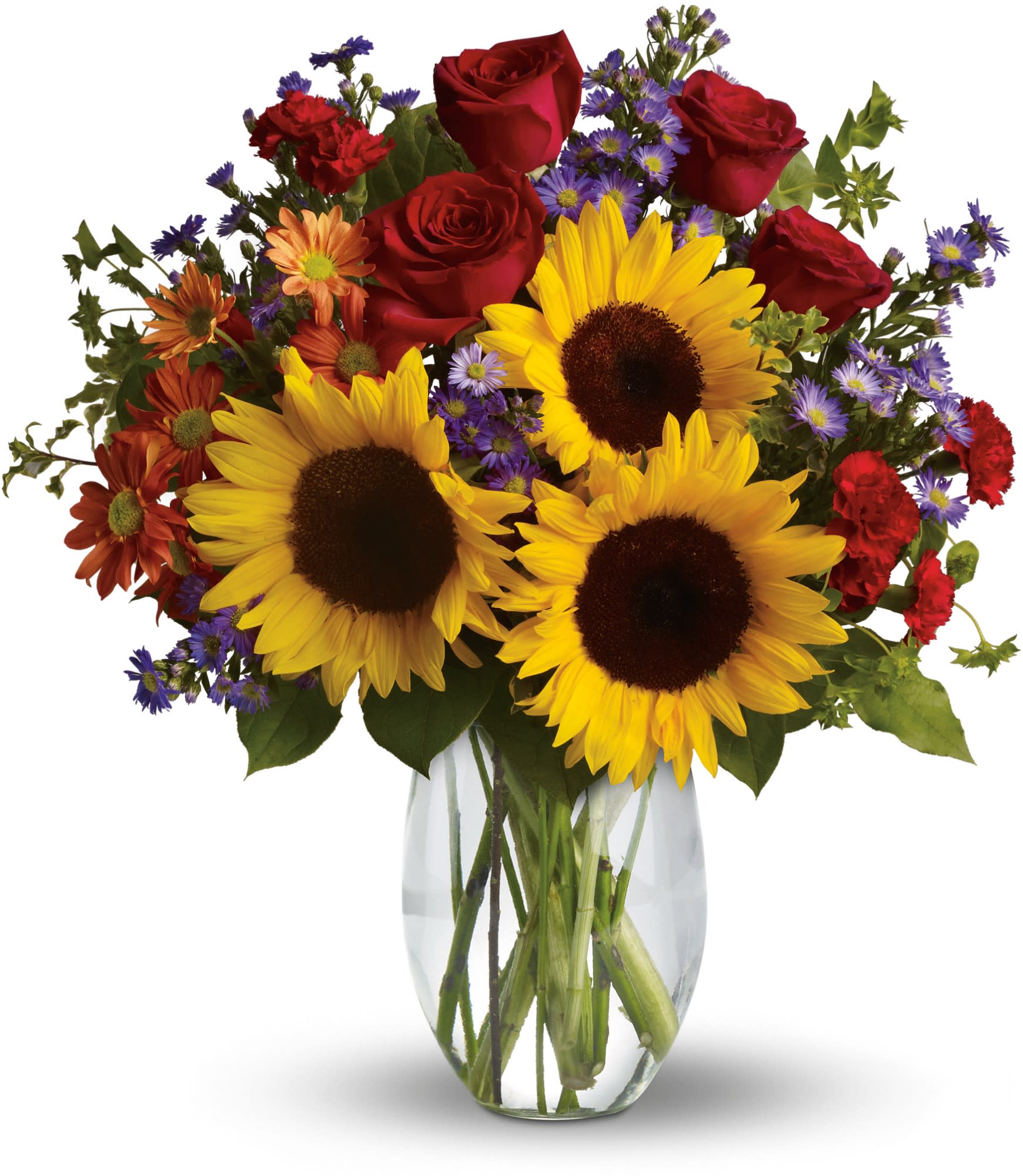 Bouquet of sunflowers, red roses, and purple daisies in a glass vase
