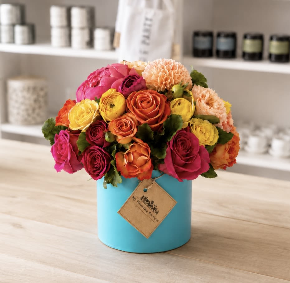 Summer Radiance – Cheerful Summer Flowers (Los Angeles Florist) - Summer Radiance Arrangement Bring sunshine indoors with our Summer Radiance Arrangement by My Blooming Business. Bursting with vibrant, bold blooms in a stylish aqua ceramic vase, this joyful floral design features a radiant mix of pink roses, pink peonies, pink tulips, yellow spray roses, peach roses, golden yarrow, and lush seasonal greenery.  Perfect for brightening a someone sick, celebrations, or simply saying “you matter,” this cheerful arrangement captures the warmth and beauty of summer in every petal.  Available for same-day flower delivery in Los Angeles, this best-selling floral gift adds instant color and happiness to any space.