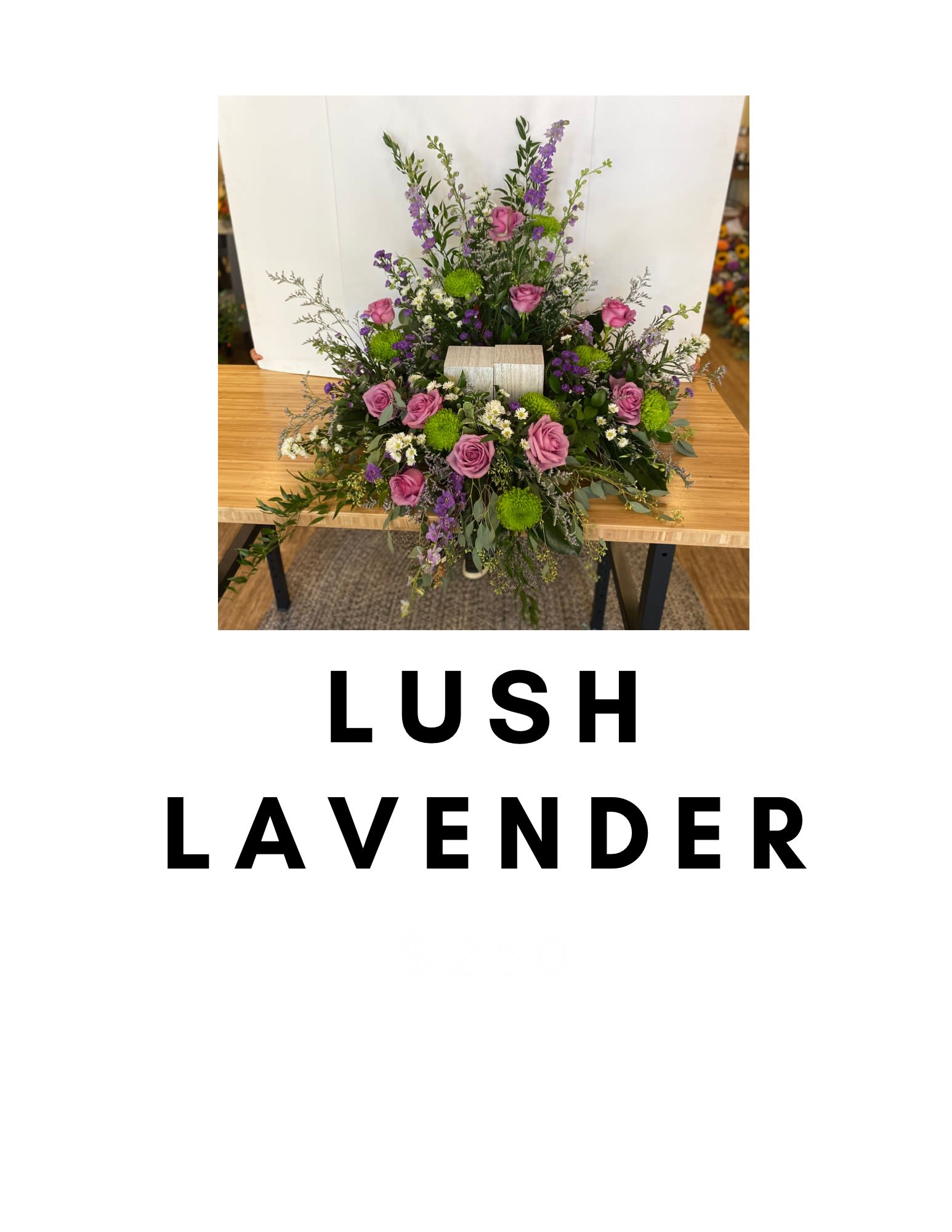 Lavender and pink floral arrangement with green accents