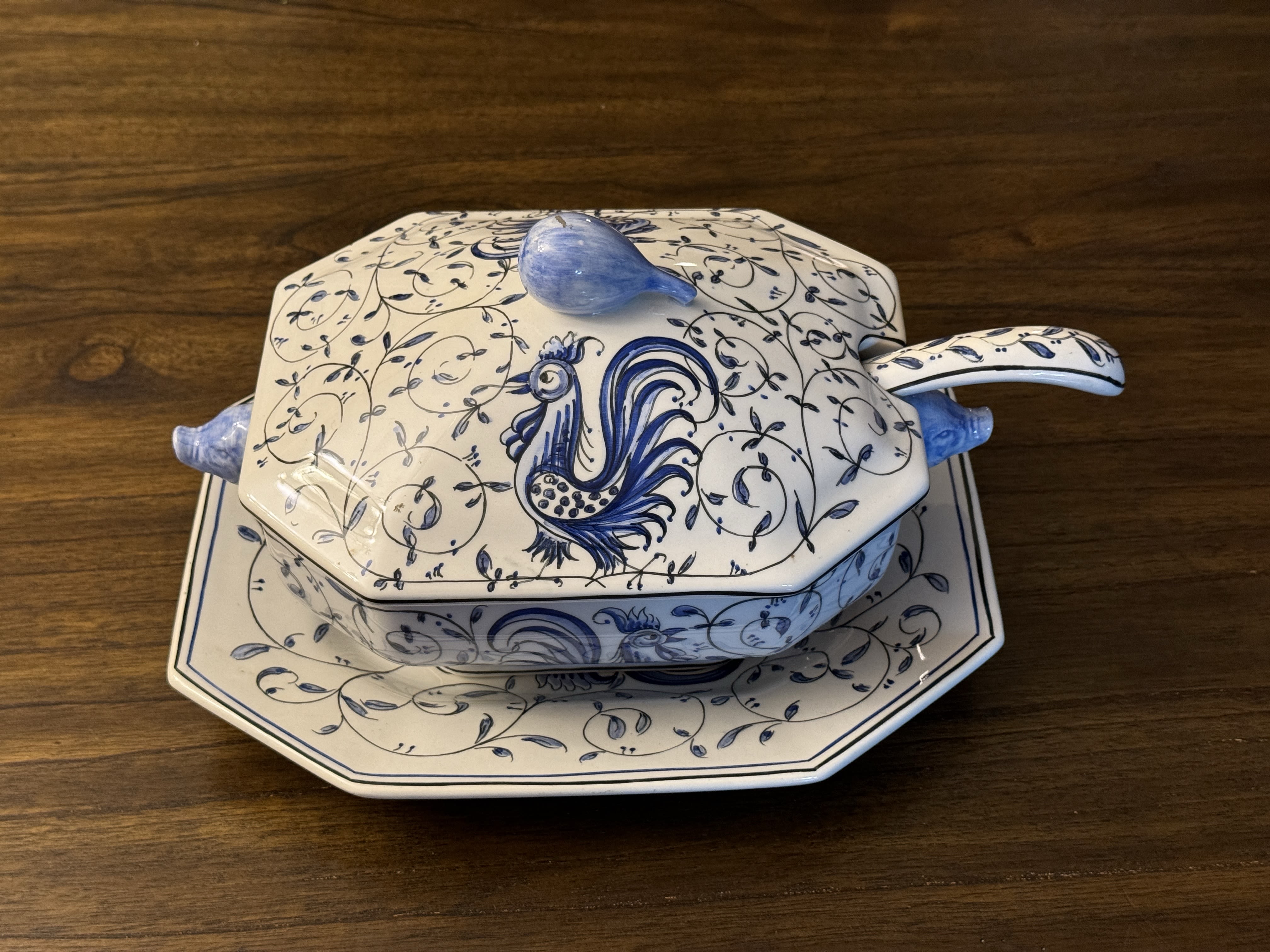 Blue-and-white ceramic covered serving dish on a matching platter