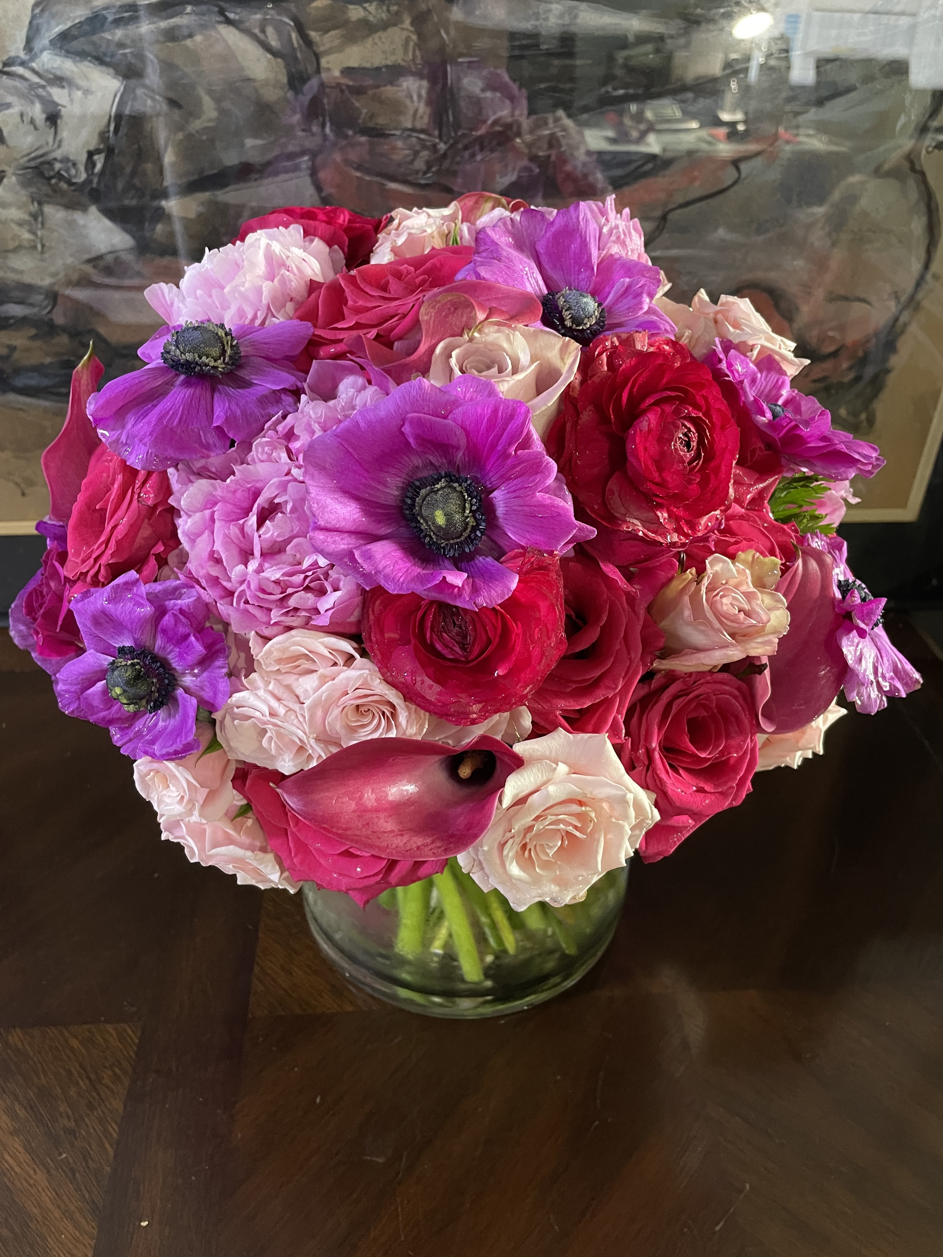 Bouquet of pink and purple flowers in a glass vase