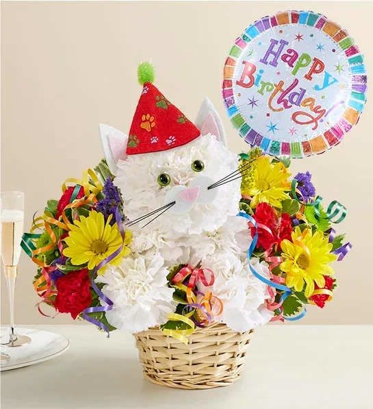 Cat-shaped flower basket with a birthday balloon and colorful blooms