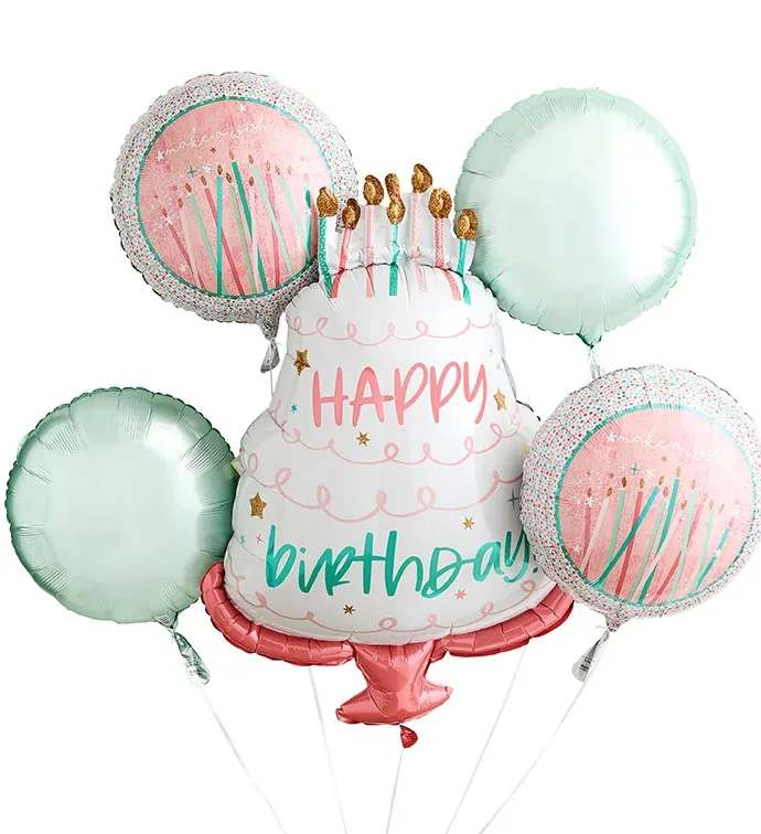 Birthday cake-shaped balloons with pastel round balloons