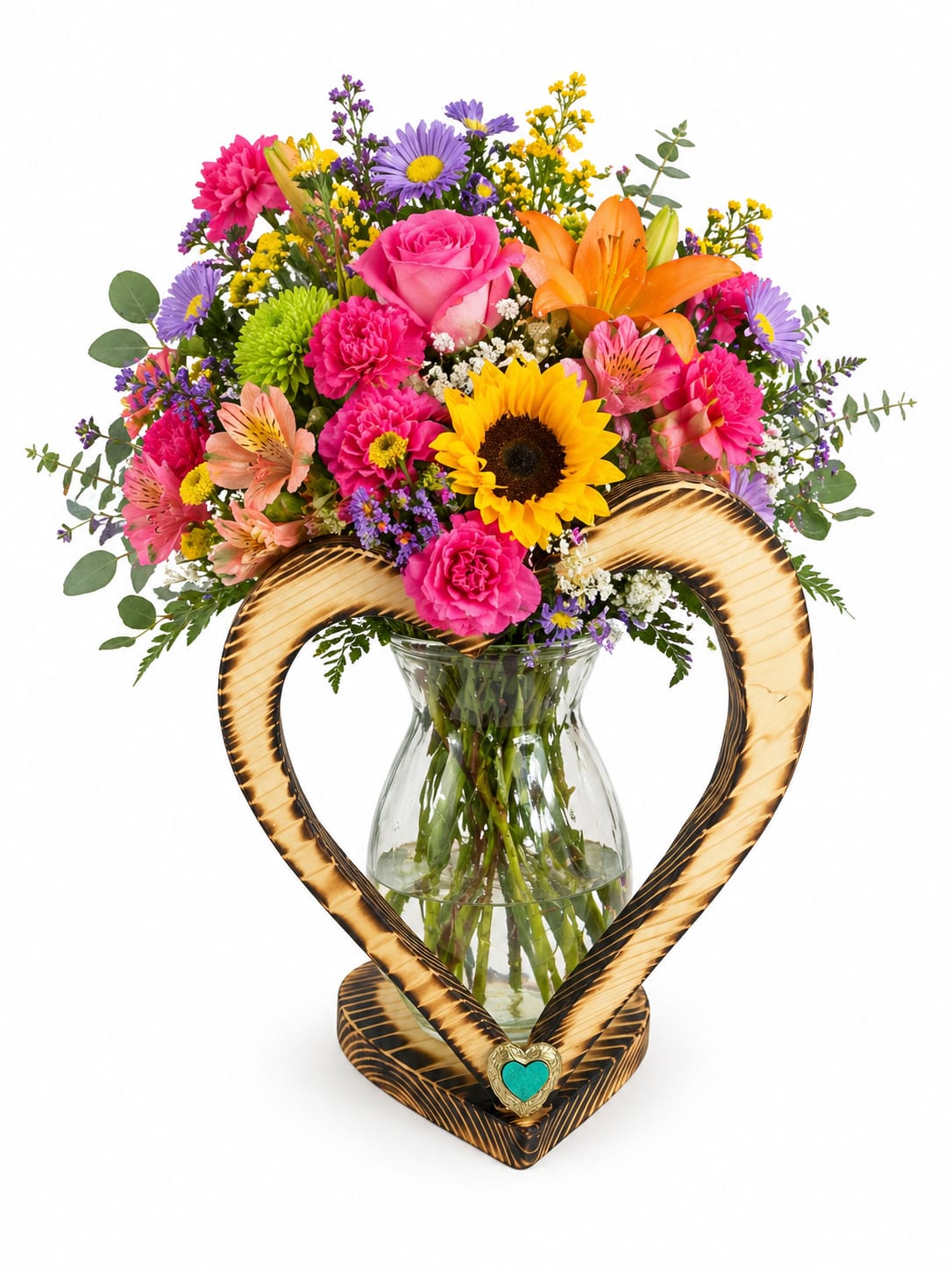 Beautiful flowers for you - Bright, rounded blooms in pink, purple, yellow and orange create an immediate burst of joy-perfect as a birthday bouquet or a "just because" surprise. This flower arrangement places roses, lilies, gerbera-style daisies and carnations together with alstroemeria, asters and other mixed blooms for a lively, romantic look that also reads as a heartfelt thank-you or love-and-romance gift. The large heart-shaped decorative frame around the vase gives the design a celebratory, affectionate accent that makes the recipient feel genuinely seen.  Arranged tightly in a clear glass vase, the composition is full and abundant: bright pink roses and hot-pink carnations sit alongside orange lilies and yellow sunflower-like daisies, while purple daisy-like blooms and small filler flowers add depth and airy texture. The dense, layered style measures as a generous, rounded bouquet with greenery extending the silhouette outward. Ideal for birthdays, anniversaries, expressions of thanks, or an everyday romantic gesture-no special care beyond fresh water and a cool spot keeps the blooms looking their best; replace vase water every other day and trim stems slightly for longer enjoyment.