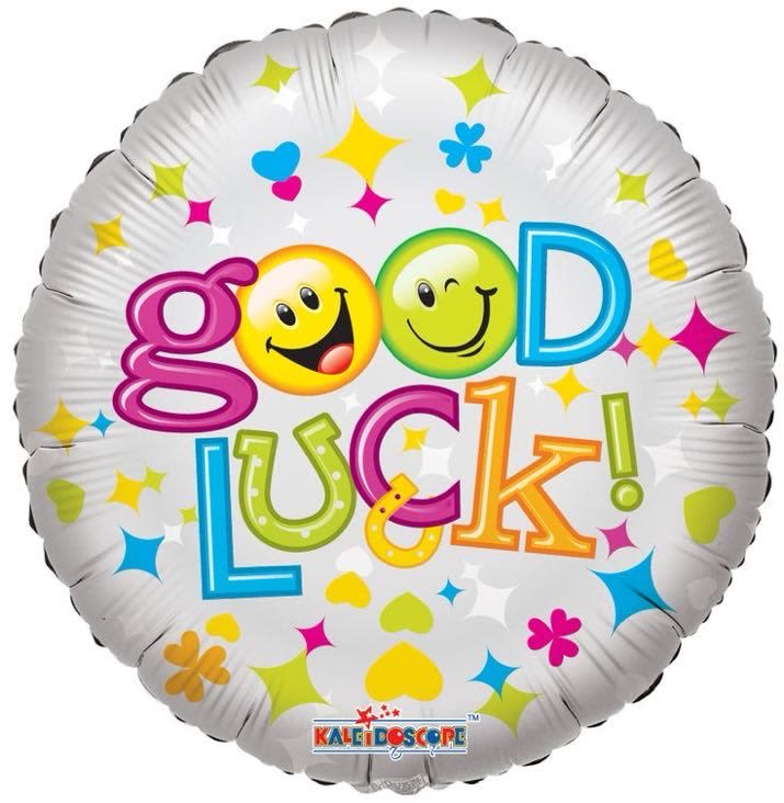 Round foil balloon with "good luck!" text and colorful smiley faces